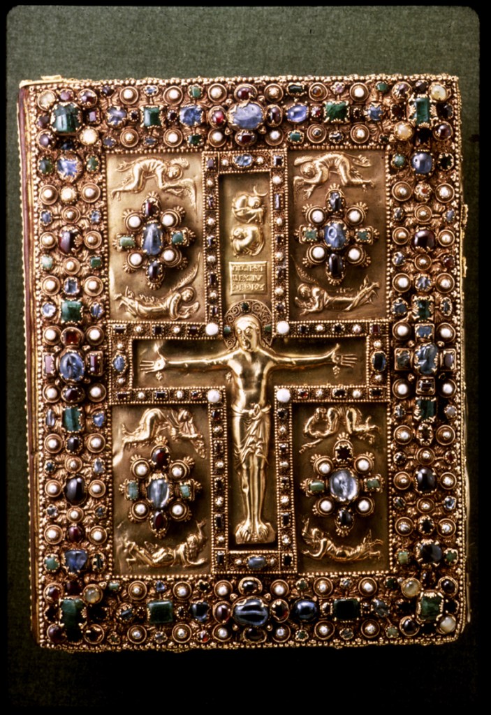 Lindau Gospel Book Cover The Lindau Gospel Book Cover is a signatory representative of the early and mid 9th century due to its quality to compel and garner admiration from the common masses. The cover exemplifies the attributes of many other works from its period. It is a safe assumption that the majorityof the citizens that lived during the time these works were created couldn’t read, and that works of art such as the book cover could function as a metaphor for the story contained within. Stories like the Passion could be depicted on a slab of stone or pressed into a sheet of gold to show levels of importance on particular moments.