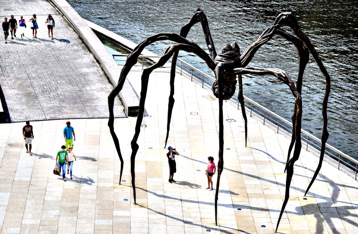 General Views Of Northern Spanish City...Pedestrians pass the "S